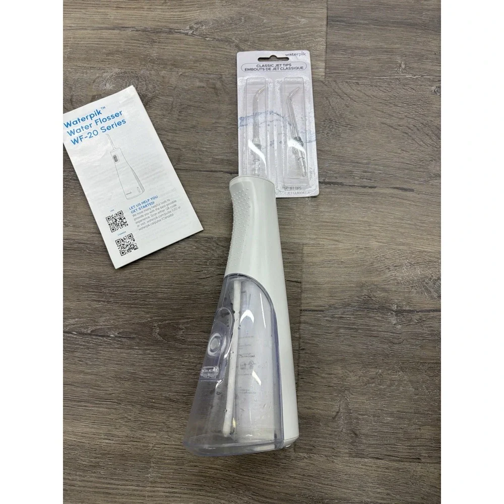Waterpik Cordless Pulse 3100 Rechargeable Portable Water Flosser With 2 New Tips
